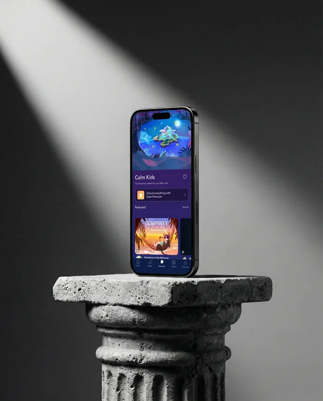Elegant iPhone Mockup on Textured Stone Pedestal