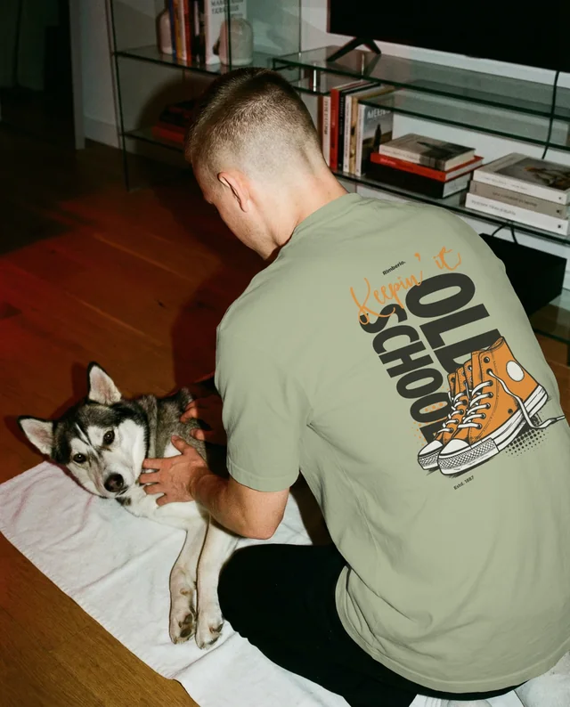 Cozy T-Shirt Mockup with Person and Dog Interaction