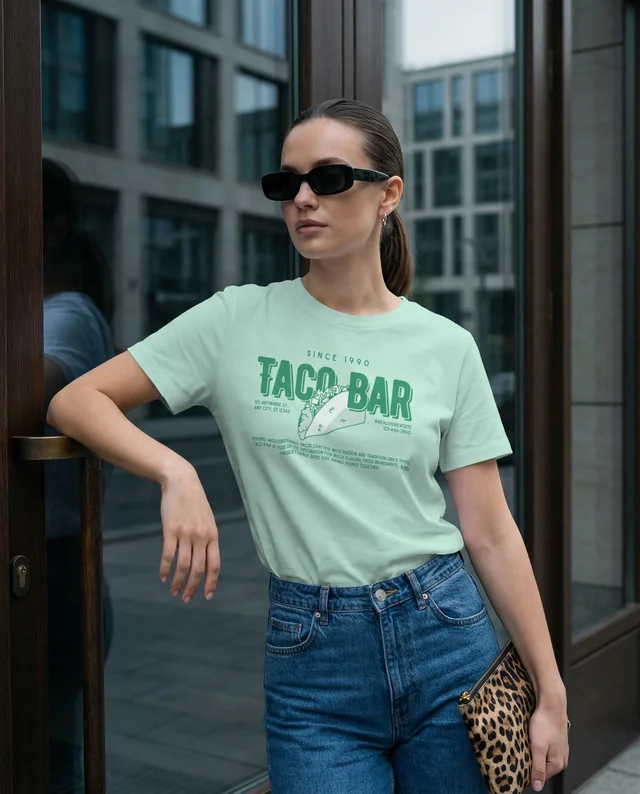 Stylish T-Shirt Mockup of a Confident Young Woman