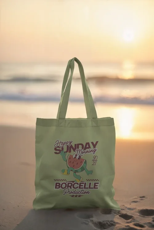 Elegant Tote Bag Mockup on a Serene Beach at Sunset