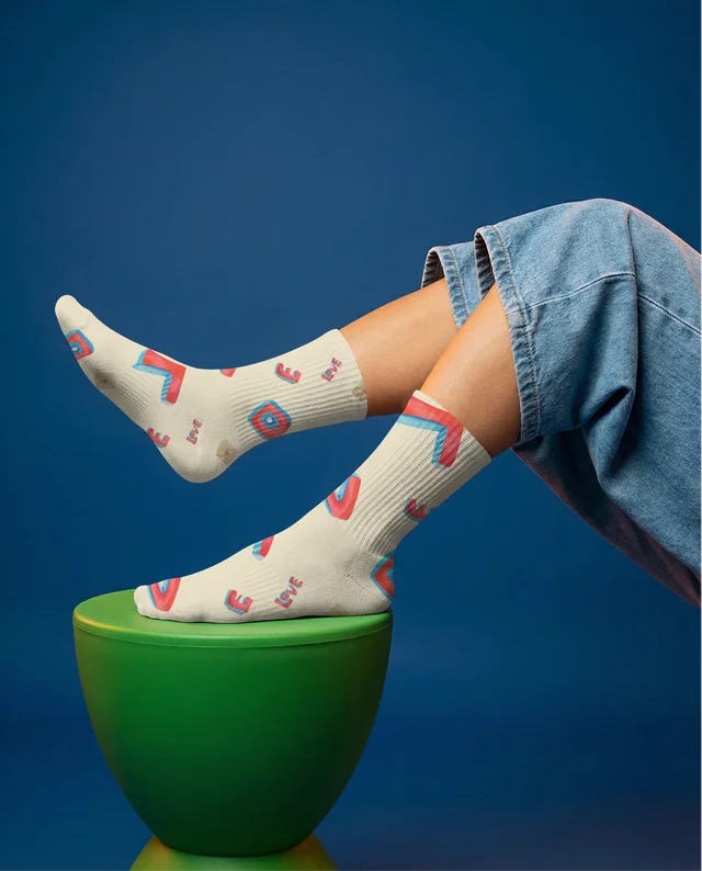 Playful Mockup of Feet in White Socks on Green Stool
