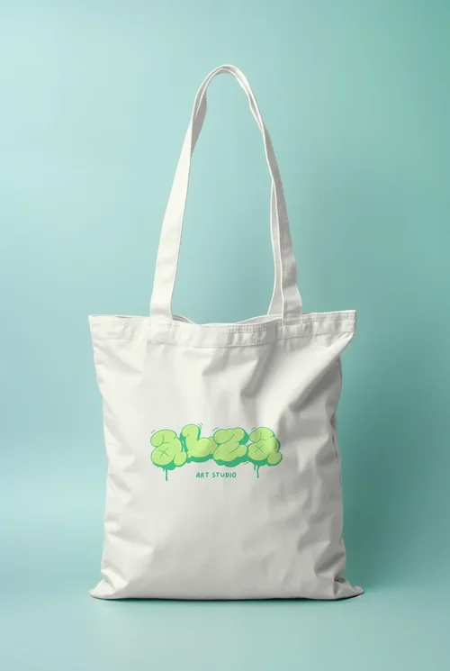 Stylish Mockup of a White Cotton Tote Bag on Light Blue