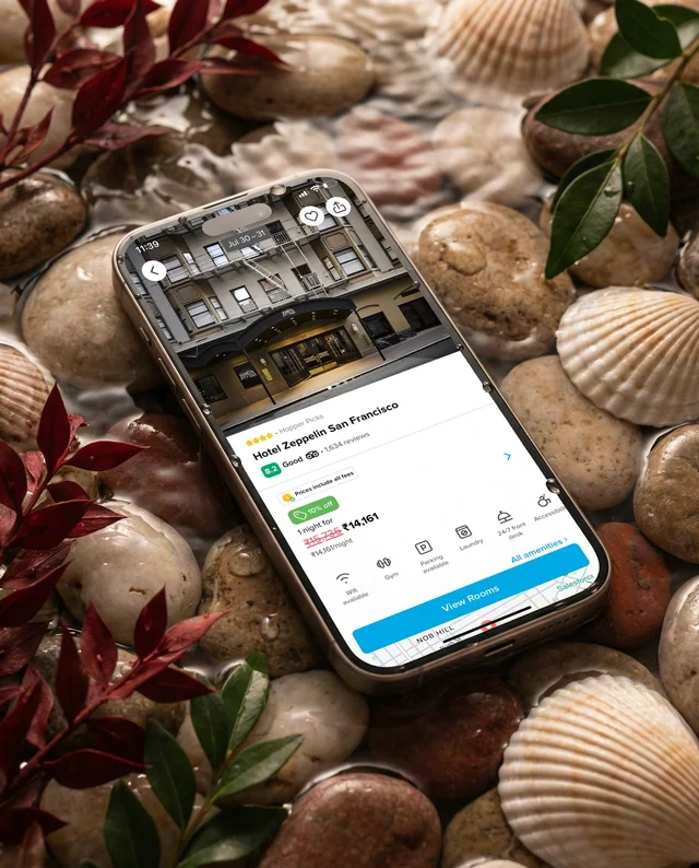 Modern iPhone Mockup on Colorful Pebbles and Water