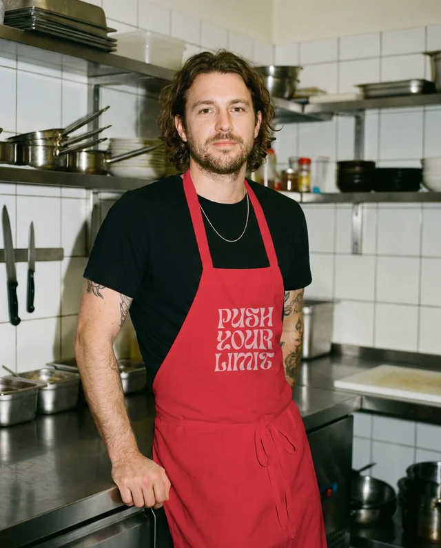 Confident Male Chef Mockup in Professional Kitchen Setting