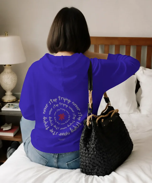 Cozy Hoodie Mockup of Young Woman in Relaxed Bedroom