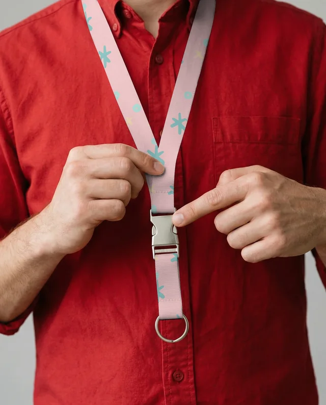 Person Fastening a Stylish Lanyard in Red Shirt Mockup