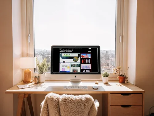 Cozy Workspace Mockup with iMac and Natural Light