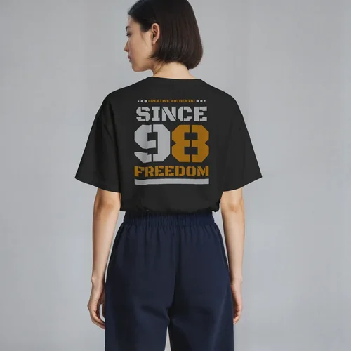 Mockup of T-Shirt in Soft Beige Against Gray Background