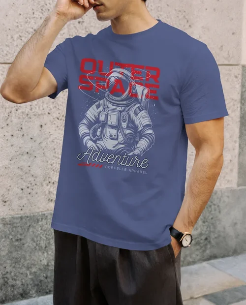 Stylish T-Shirt Mockup of a Young Man Against Wall
