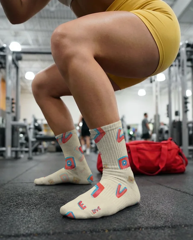 Dynamic Gym Mockup Featuring Vibrant Socks and Squats