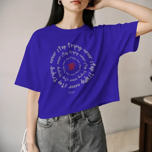 Stylish T-Shirt Mockup of a Confident Young Woman