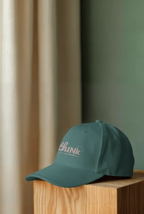 Stylish Mockup of a White Hat on a Wooden Pedestal