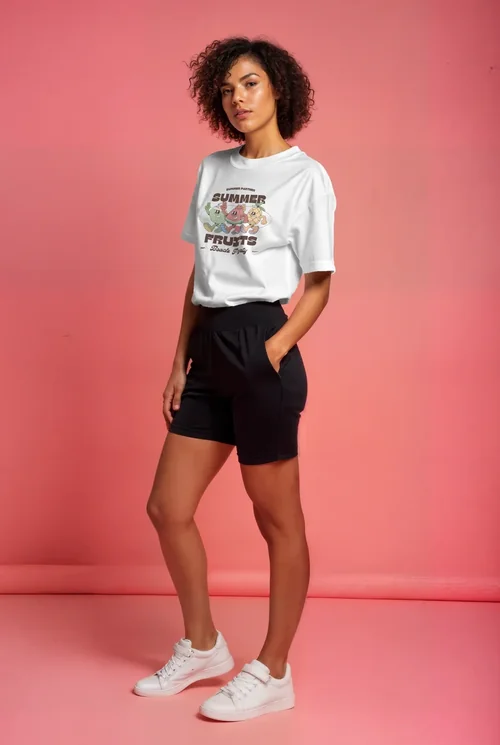 Mockup of T-Shirt Against Soft Pink Background with Style