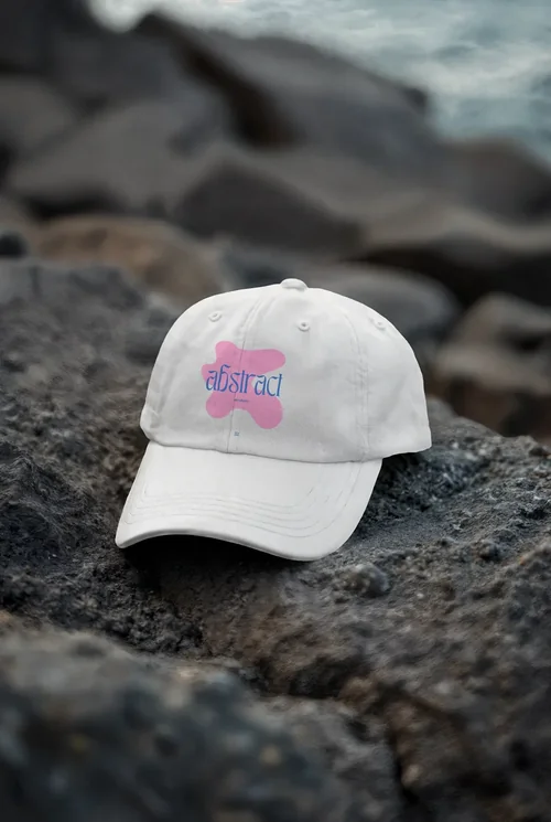 Stylish Mockup of a Hat on Rugged Rocky Surface