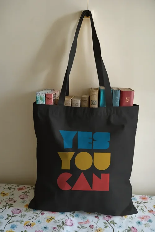 Elegant Mockup of a Vintage Tote Bag with Books