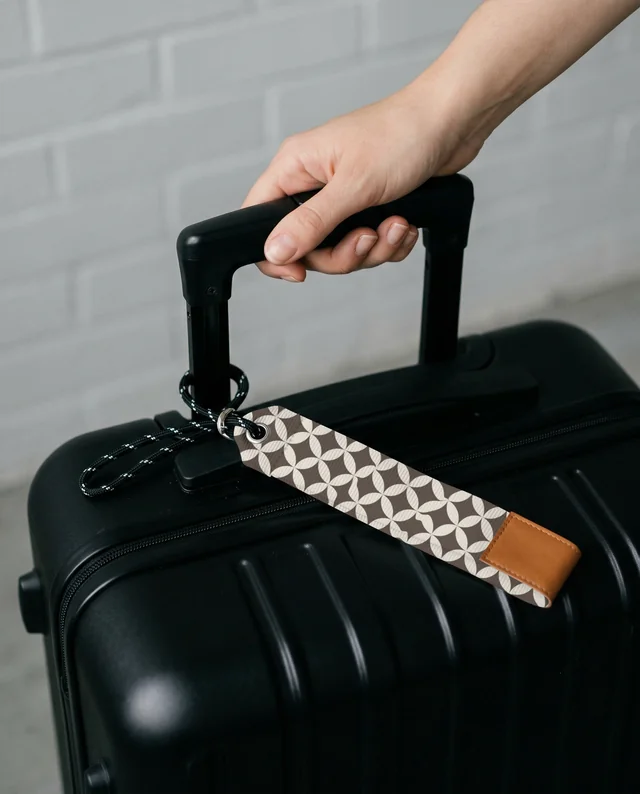 Chic Mockup of Lanyard and Black Hard-Shell Suitcase