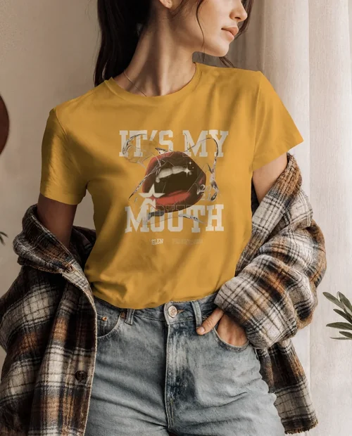 Stylish T-Shirt Mockup of a Young Woman in Cozy Setting