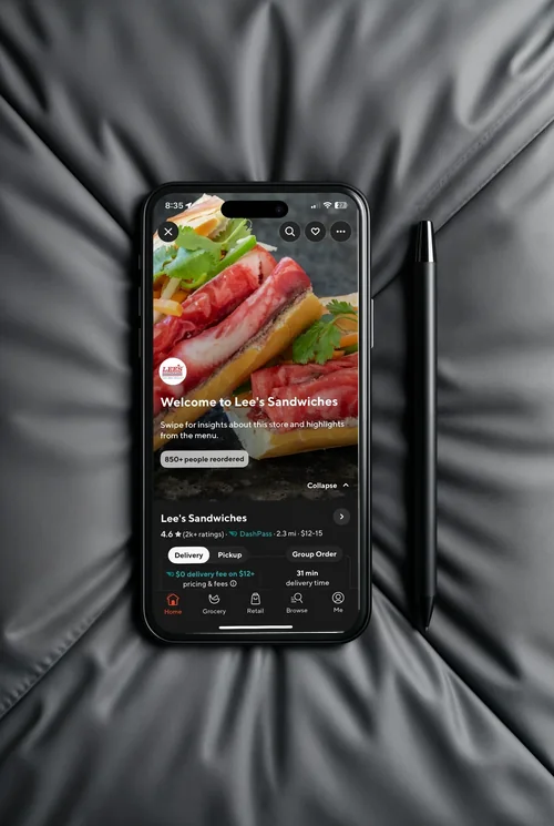 Modern iPhone 16 Pro Max Mockup on Gray Couch