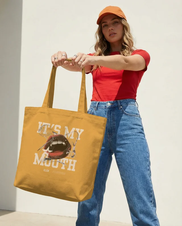 Stylish Mockup of a Tote Bag with Confident Model