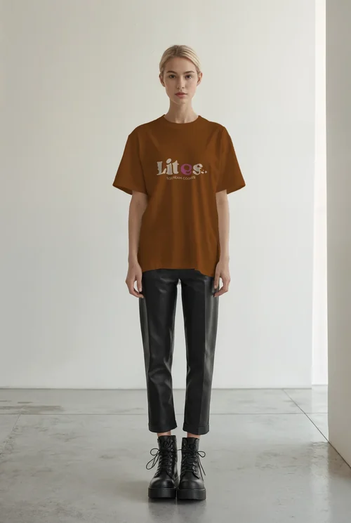 Chic T-Shirt Mockup Featuring a Confident Female Model