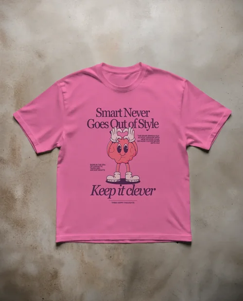 Mockup of a Soft Pastel Pink T-Shirt on Concrete Surface