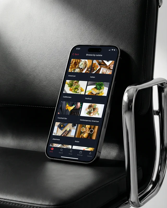 Minimalist iPhone Mockup on Stylish Leather Chair