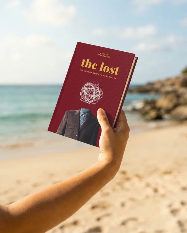 Serene Beach Mockup Featuring a Blank Book