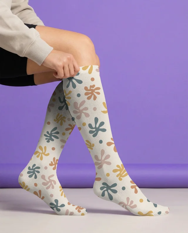 Stylish Mockup of Person Pulling Up Knee-High Socks