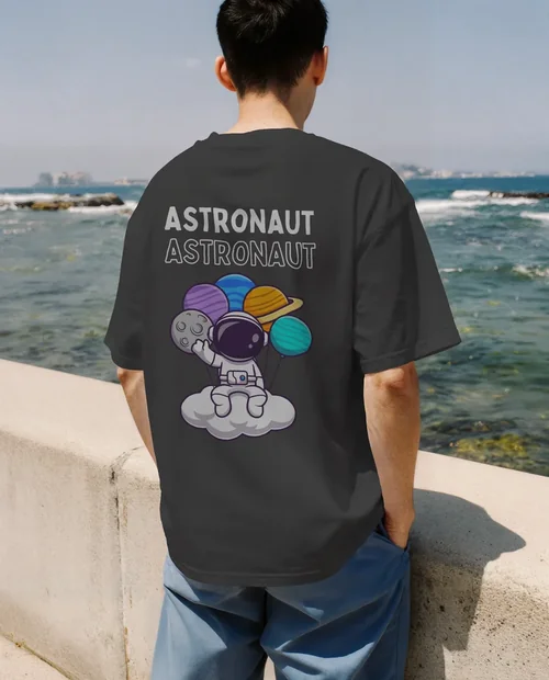 Summer Mockup of Young Man in T-Shirt by the Ocean