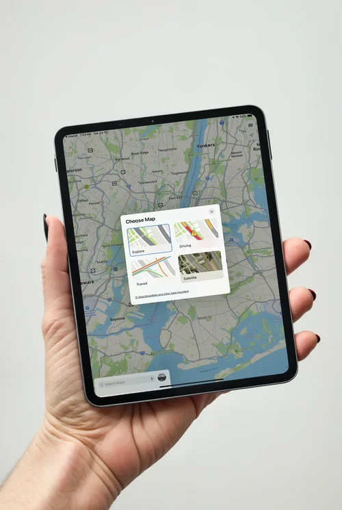 Realistic iPad Mockup: Hand Holding Black iPad Pro
