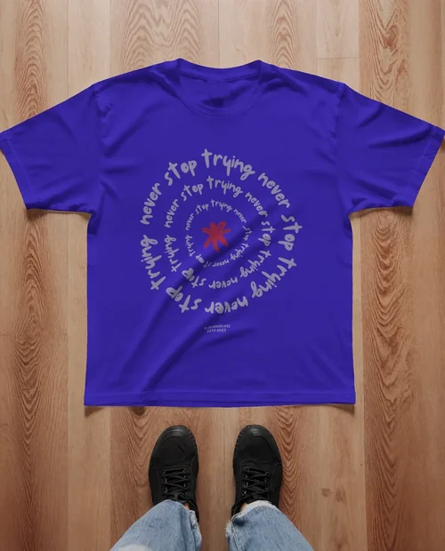 Stylish T-Shirt Mockup on Wooden Floor for Design Showcase