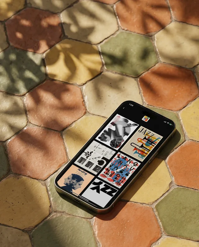 Sleek iPhone Mockup on Colorful Hexagonal Tiles