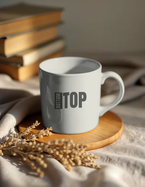 Mockup of a Mug on a Light Brown Wooden Table with Gray Linen