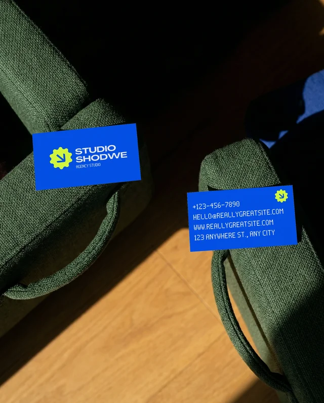 Elegant Business Card Mockup on Green Armchairs