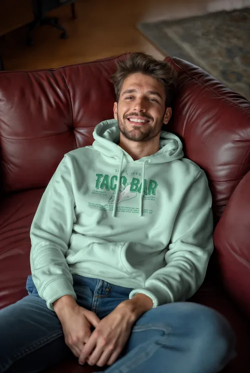 Cozy Hoodie Mockup on Burgundy Couch with Warm Colors