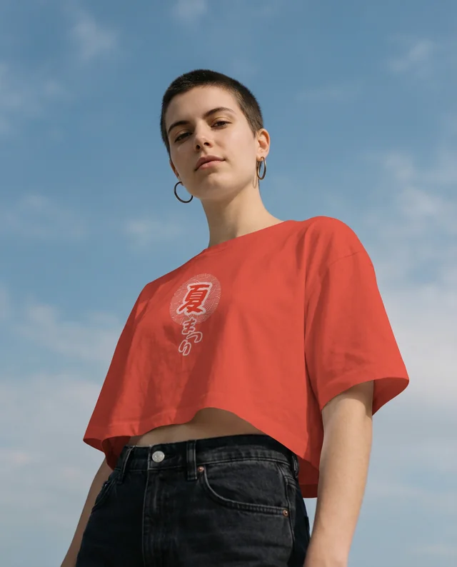 Confident Young Person in Crop Top Mockup Against Sky