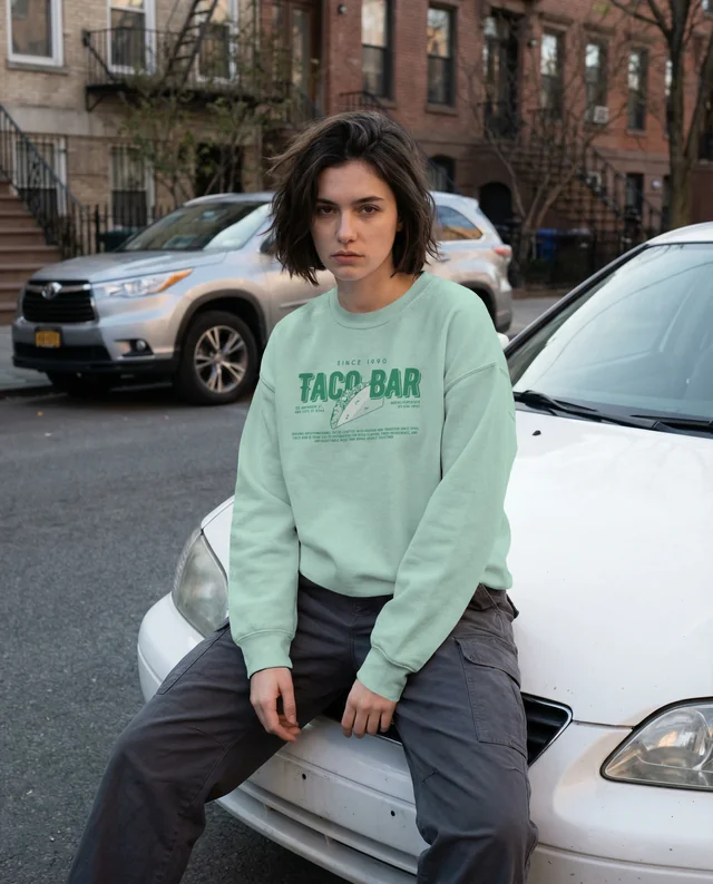 Urban Mockup of a Young Adult in a Stylish Sweatshirt