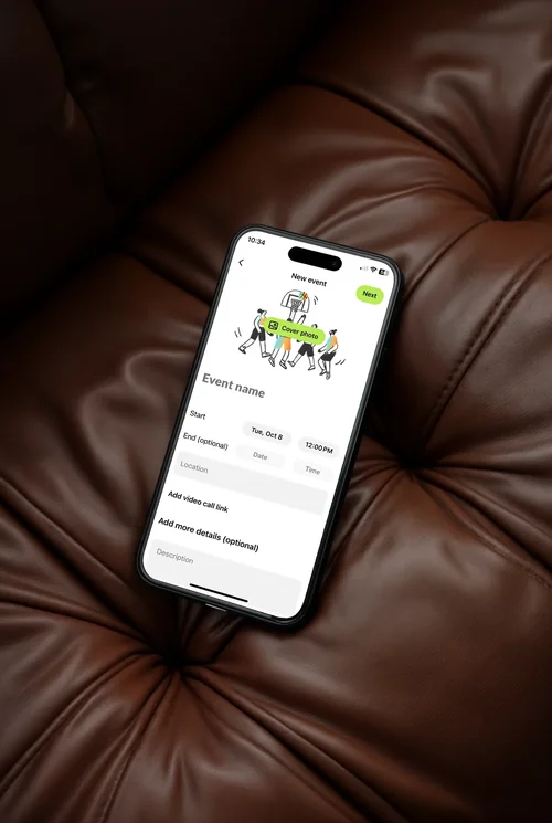 Black iPhone 16 Pro Max Mockup on Leather Couch