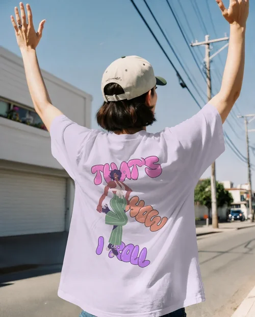 Joyful T-Shirt Mockup on a Sunlit Street Scene