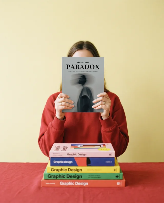 Cozy Mockup of a Person with a Book in Warm Setting