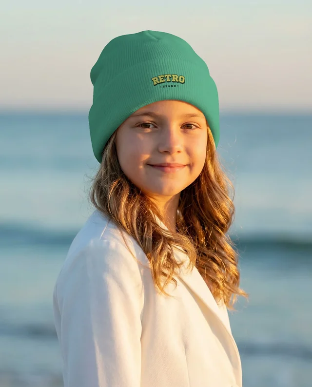 Young Girl in Cozy Beanie at Sunset Beach Mockup