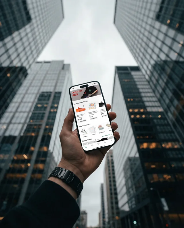 Urban iPhone Mockup with Skyscrapers in Background