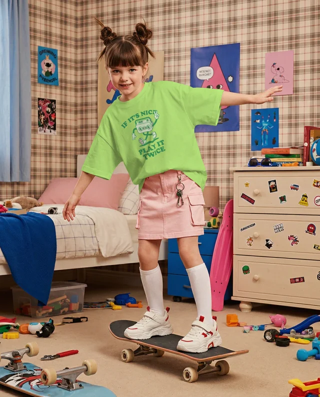 Cheerful T-Shirt Mockup for Young Skateboarder