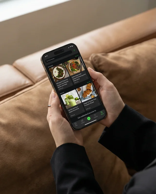 Modern iPhone Mockup in Cozy Living Room Setting