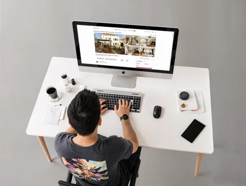 Modern iMac Mockup in a Minimalist Workspace Design