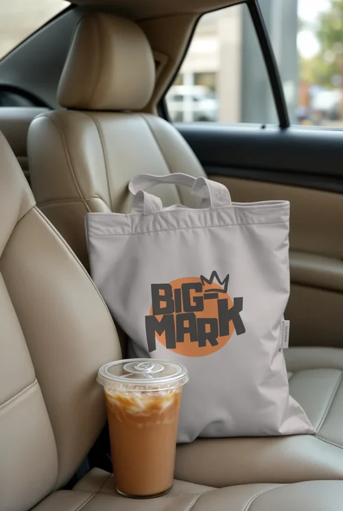 Cream Tote Bag Mockup with Iced Coffee in Car Setting